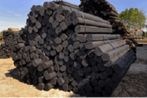Stack Of Creosote Fence Poles